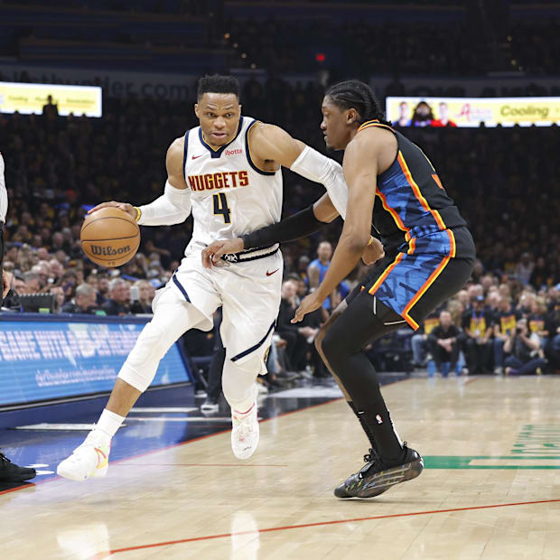 Denver Nuggets goalkeeper Russell Westbrook (4) leads against Oklahoma City Thunder Jalen Williams attacker