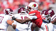 Louisville Cardinals defensive lineman AJ Green (17) sacks Eastern Kentucky Colonels quarterback Myles Burkett (10) during the first half against EKU at the Cardinals' season opener Saturday, August 30, 2025 at L&N Federal Credit Union Stadium in Louisville, Kentucky.