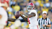 Jan 1, 2024; Pasadena, CA, USA; Alabama Crimson Tide quarterback Jalen Milroe (4) looks to pass in the second quarter against the Michigan Wolverines in the 2024 Rose Bowl college football playoff semifinal game at Rose Bowl. Mandatory Credit: Gary A. Vasquez-USA TODAY Sports