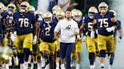 Notre Dame head coach Marcus Freeman takes the field with his team before a NCAA football game against Texas A&M at Notre Dame Stadium on Saturday, Sept. 13, 2025, in South Bend.