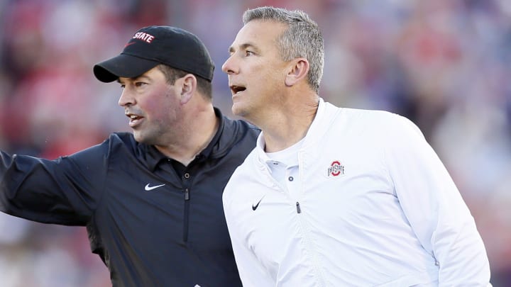 Ohio State Buckeyes head coach Urban Meyer and offensive coordinator Ryan Day yell from the sideline during the second quarter of the Rose Bowl in Pasadena, Calif. on Jan. 1, 2019. [Adam Cairns/Dispatch]