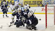 March 8, 2025; Ann Arbor, Michigan, USA; Penn State goalie Arsenii Sergeev (35) makes a save during the third period of the game against the Michigan Wolverines at Yost Ice Arena.