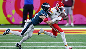 Feb 9, 2025; New Orleans, LA, USA; Kansas City Chiefs wide receiver Xavier Worthy (1) runs with the ball against Philadelphia Eagles cornerback Cooper DeJean (33) during the first half of Super Bowl LIX at Caesars Superdome.
