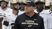Purdue Boilermakers head coach Barry Odom takes the field 