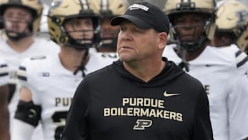Purdue Boilermakers head coach Barry Odom takes the field 