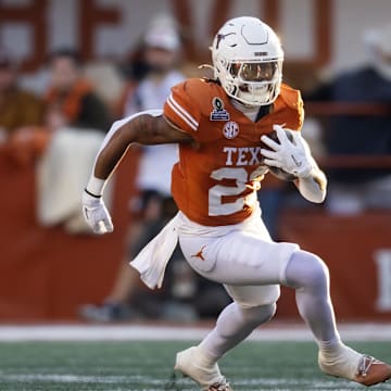 Dec 21, 2024; Austin, Texas, USA; Texas Longhorns running back Jaydon Blue (23) against the Clemson Tigers during the CFP National playoff first round at Darrell K Royal-Texas Memorial Stadium. Mandatory Credit: Mark J. Rebilas-Imagn Images