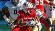 Jacksonville State's Ron Wiggins tries to evade the tackle of FIU's Percy Courtney Jr. during college football action at AmFirst Stadium in Jacksonville, Alabama November 16, 2024. (Dave Hyatt / Hyatt Media LLC)