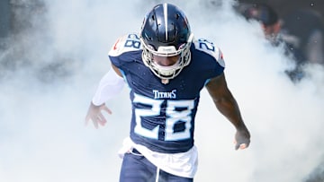 Oct 13, 2024; Nashville, Tennessee, USA;  Tennessee Titans safety Quandre Diggs (28) runs out during player introductions against the Indianapolis Colts at Nissan Stadium. Mandatory Credit: Steve Roberts-Imagn Images