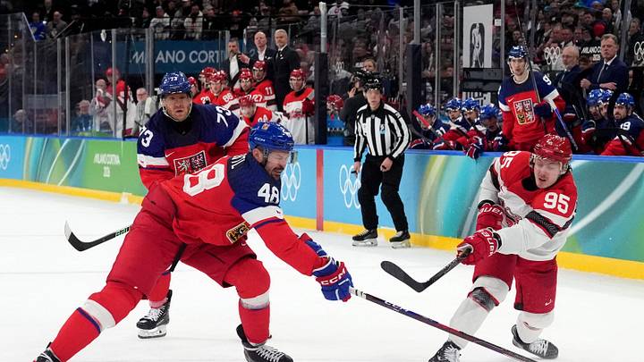 Feb 17, 2026; Milan, Italy;  Tomas Hertl of Czech Republic in action with Nick Olesen of Denmark during a men's ice hockey qualification playoff game during the Milano Cortina 2026 Olympic Winter Games at Milano Santagiulia Ice Hockey Arena. Mandatory Credit: Amber Searls-Imagn Images