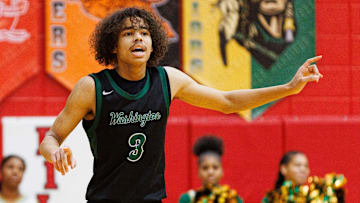 Washington's Steven Reynolds III calls out to his teammates during an IHSAA 3A Sectional boys basketball game between Saint Joseph and Washington at Plymouth High School on Wednesday, March 5, 2025, in Plymouth.