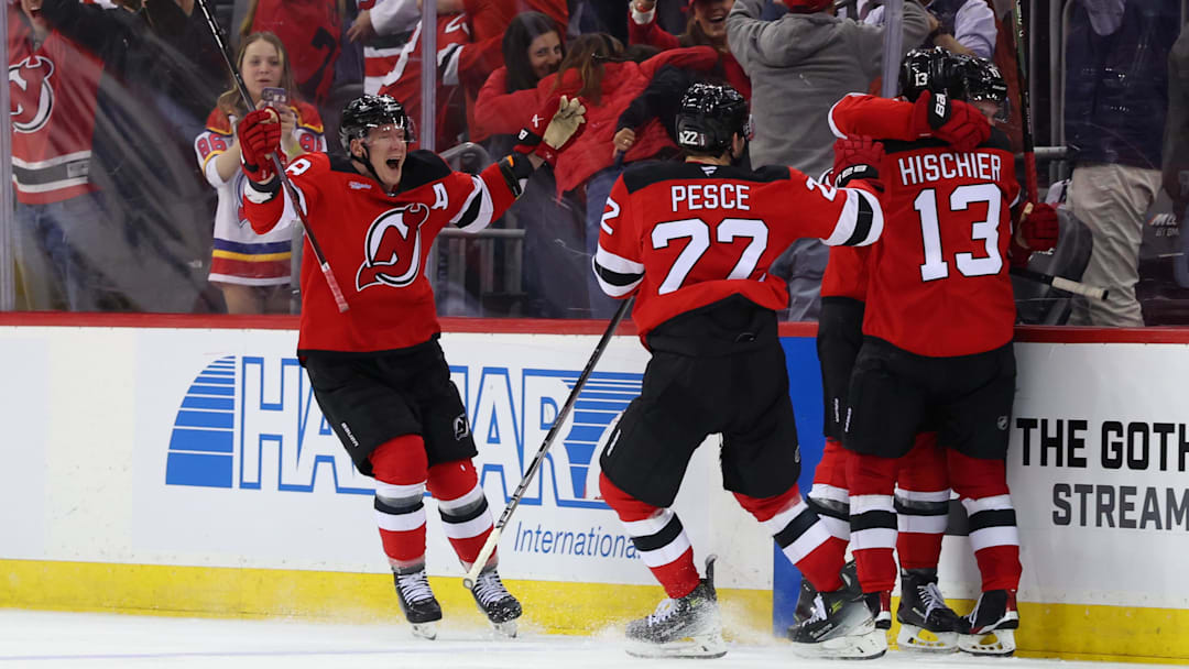 Apr 25, 2025; Newark, New Jersey, USA; New Jersey Devils defenseman Simon Nemec (17) celebrates his game winning goal against the Carolina Hurricanes during the second overtime in game three of the first round of the 2025 Stanley Cup Playoffs at Prudential Center. Mandatory Credit: Ed Mulholland-Imagn Images