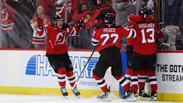 Apr 25, 2025; Newark, New Jersey, USA; New Jersey Devils defenseman Simon Nemec (17) celebrates his game winning goal against the Carolina Hurricanes during the second overtime in game three of the first round of the 2025 Stanley Cup Playoffs at Prudential Center. Mandatory Credit: Ed Mulholland-Imagn Images