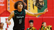 Washington's Steven Reynolds III calls out to his teammates during an IHSAA 3A Sectional boys basketball game