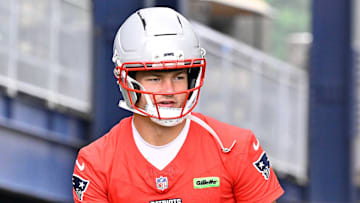 Jun 9, 2025; Foxborough, MA, USA; New England Patriots quarterback Drake Maye (10) and safety Kyle Dugger (23) walk to the practice fields at Gillette Stadium. Mandatory Credit: Eric Canha-Imagn Images