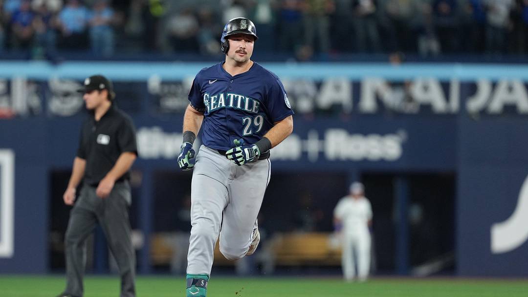 Oct 20, 2025; Toronto, Ontario, CAN; Seattle Mariners catcher Cal Raleigh (29) rounds the bases after hitting a home run in the fifth inning against the Toronto Blue Jays during game seven of the ALCS round for the 2025 MLB playoffs at Rogers Centre. Mandatory Credit: Nick Turchiaro-Imagn Images