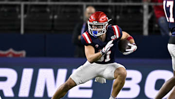 Jan 30, 2025; Arlington, TX, USA; East wide receiver Efton Chism of Eastern Washington (81) runs with the ball during the first half against the West at AT&T Stadium. Mandatory Credit: Jerome Miron-Imagn Images