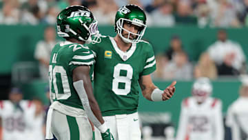 Aaron Rodgers and Breece Hall