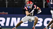 East wide receiver Efton Chism of Eastern Washington (81) runs with the ball during the first half against the West at AT&T Stadium