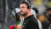 Nov 8, 2025; Iowa City, Iowa, USA; Oregon Ducks head coach Dan Lanning looks on during the first quarter against the Iowa Hawkeyes at Kinnick Stadium. Mandatory Credit: Jeffrey Becker-Imagn Images