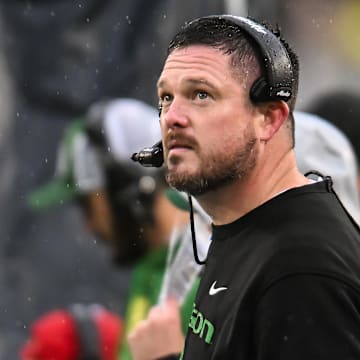 Nov 8, 2025; Iowa City, Iowa, USA; Oregon Ducks head coach Dan Lanning looks on during the first quarter against the Iowa Hawkeyes at Kinnick Stadium. Mandatory Credit: Jeffrey Becker-Imagn Images