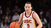 Jan 12, 2025; Los Angeles, California, USA; USC Trojans guard Kayleigh Heckel (9) brings the ball up the court during the fourth quarter against the Penn State Nittany Lions at Galen Center. Mandatory Credit: Robert Hanashiro-Imagn Images