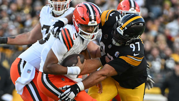 Football player makes a tackl