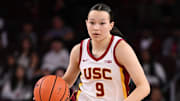 Jan 12, 2025; Los Angeles, California, USA; USC Trojans guard Kayleigh Heckel (9) brings the ball up the court during the fourth quarter against the Penn State Nittany Lions at Galen Center. Mandatory Credit: Robert Hanashiro-Imagn Images