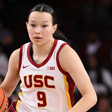 Jan 12, 2025; Los Angeles, California, USA; USC Trojans guard Kayleigh Heckel (9) brings the ball up the court during the fourth quarter against the Penn State Nittany Lions at Galen Center. Mandatory Credit: Robert Hanashiro-Imagn Images