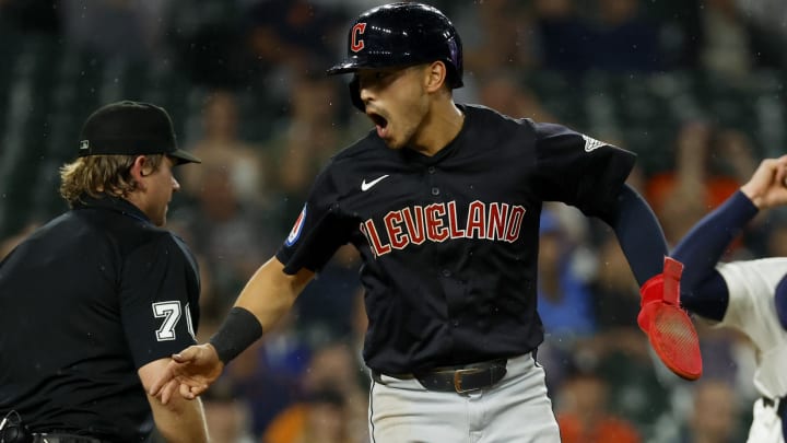 Jul 9, 2024; Detroit, Michigan, USA;  Cleveland Guardians outfielder Steven Kwan (38) celebrates after scoring in tenth inning at Comerica Park. Mandatory Credit: Rick Osentoski-USA TODAY Sports