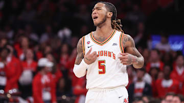 Feb 1, 2025; New York, New York, USA;  St. John's basketball guard Deivon Smith (5) reacts after getting called for a foul in the second half against the Providence Friars at Madison Square Garden.