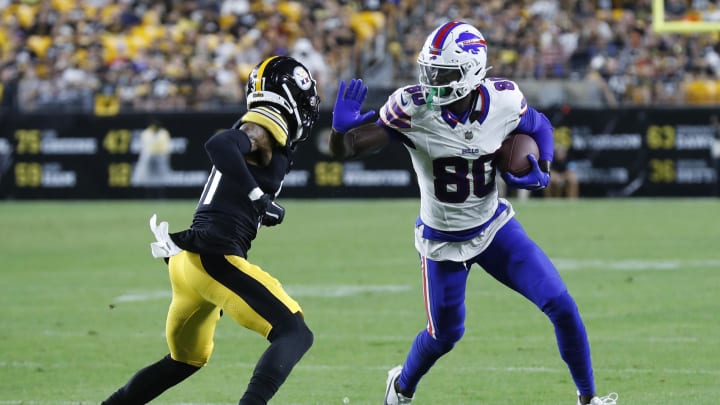 Aug 17, 2024; Pittsburgh, Pennsylvania, USA;  Buffalo Bills wide receiver Tyrell Shavers (80) runs after a catch against Pittsburgh Steelers cornerback Zyon Gilbert (31) during the fourth quarter at Acrisure Stadium. Buffalo won 9-3. Mandatory Credit: Charles LeClaire-USA TODAY Sports