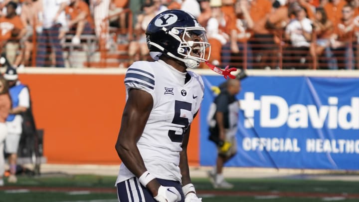 Oct 28, 2023; Austin, Texas, USA; Brigham Young Cougars wide receiver Darius Lassiter (5) reacts after drawing a penalty from Texas Longhorns defenders during the second half at Darrell K Royal-Texas Memorial Stadium. 