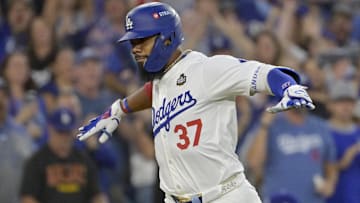Oct 26, 2024; Los Angeles, California, USA; Los Angeles Dodgers outfielder Teoscar Hernandez (37) celebrates after hitting a two run home run in the third inning against the New York Yankees during game two of the 2024 MLB World Series at Dodger Stadium. Mandatory Credit: Jayne Kamin-Oncea-Imagn Images