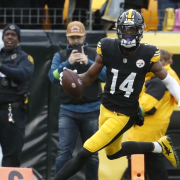 Oct 8, 2023; Pittsburgh, Pennsylvania, USA;  Pittsburgh Steelers wide receiver George Pickens (14) crosses the goal line to score a touchdown against the Baltimore Ravens during the fourth quarter at Acrisure Stadium. Mandatory Credit: Charles LeClaire-USA TODAY Sports