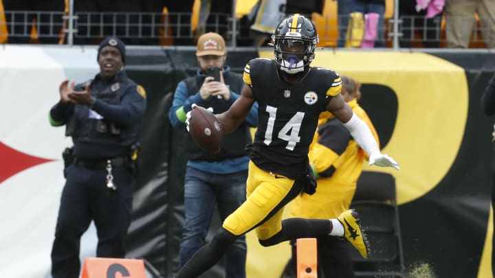 Oct 8, 2023; Pittsburgh, Pennsylvania, USA;  Pittsburgh Steelers wide receiver George Pickens (14) crosses the goal line to score a touchdown against the Baltimore Ravens during the fourth quarter at Acrisure Stadium. Mandatory Credit: Charles LeClaire-USA TODAY Sports