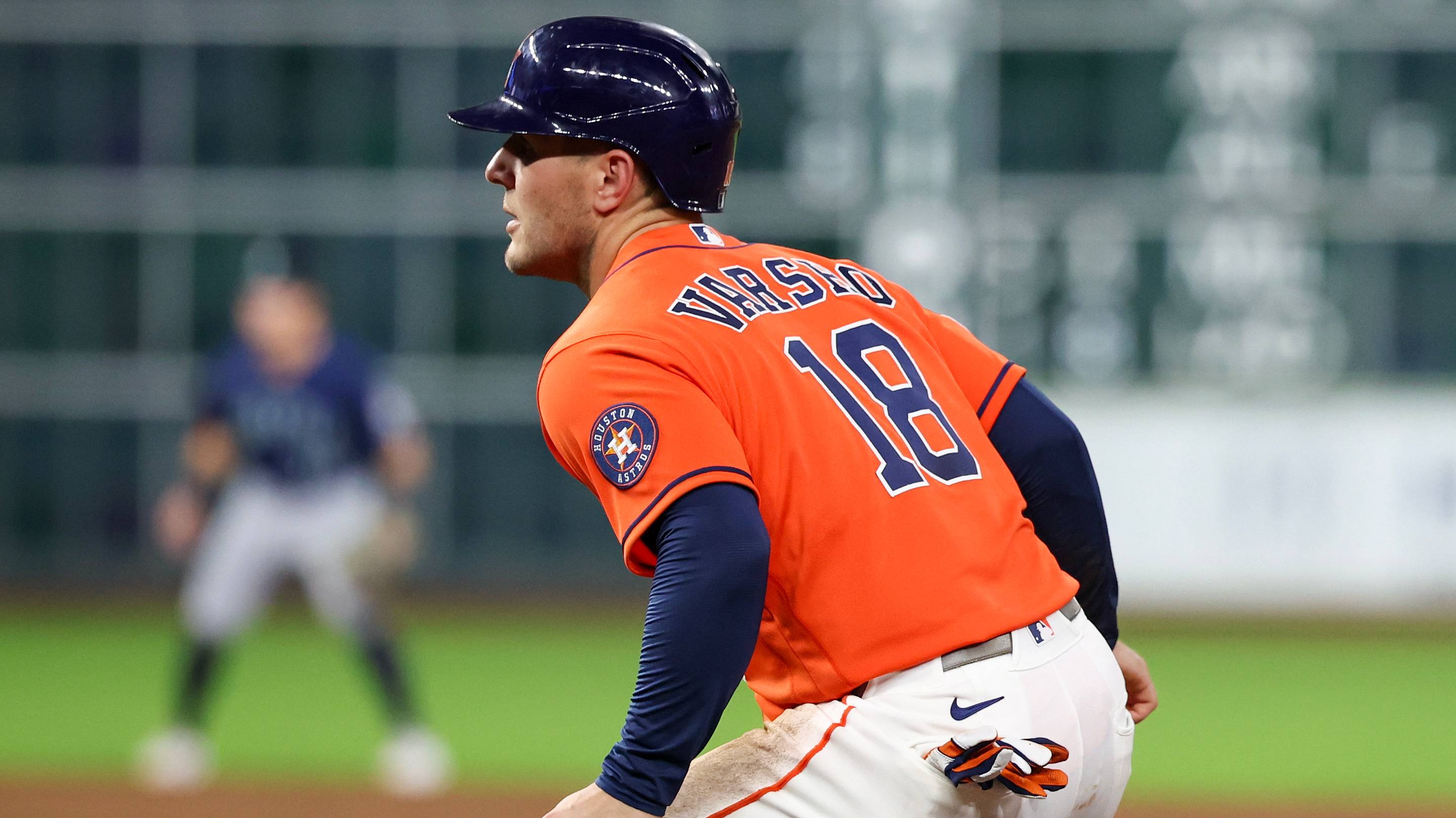 Houston Astros center fielder Daulton Varsho (18) takes a lead off first base.