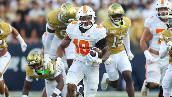 Sep 12, 2026; Atlanta, Georgia, USA; Tennessee Volunteers running back DeSean Bishop (18) runs the ball against the Georgia Tech Yellow Jackets in the first quarter at Bobby Dodd Stadium at Hyundai Field. Mandatory Credit: Brett Davis-Imagn Images