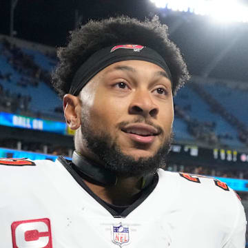 Dec 1, 2024; Charlotte, North Carolina, USA; Tampa Bay Buccaneers safety Antoine Winfield Jr. (31) and cornerback Tavierre Thomas (37) leave the field after the game at Bank of America Stadium. Mandatory Credit: Bob Donnan-Imagn Images
