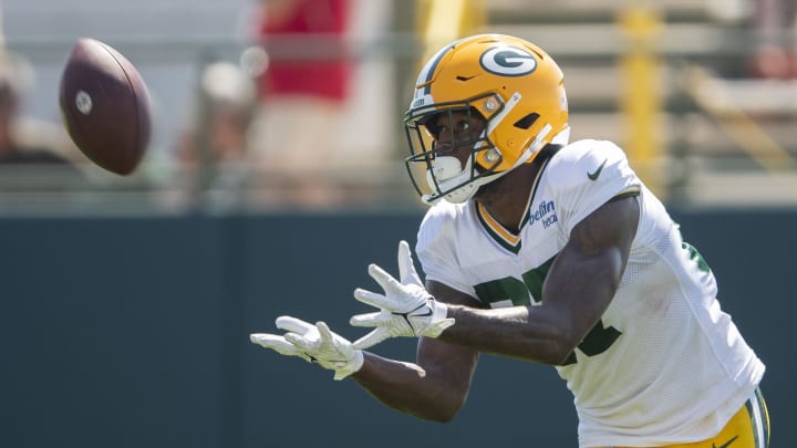 Green Bay Packers wide receiver Romeo Doubs (87) catches a pass during practice at Ray Nitschke Field.