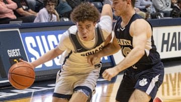 Squan Darius Adams drive to basket in second half action. Manasquan Boys basketball defeats Ranney  61-46 in Shore Conference Final in West Long Branch on February 19, 2023

Bbbsqry230219q