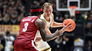 Nov 15, 2024; West Lafayette, Indiana, USA; Purdue Boilermakers guard Fletcher Loyer (2) looks to get the ball past Alabama Crimson Tide guard Latrell Wrightsell Jr. (3) during the second half at Mackey Arena. Mandatory Credit: Marc Lebryk-Imagn Images