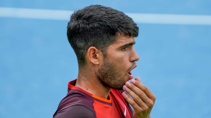 Carlos Alcaraz of Spain reacts to missing a point to Gael Monfils of France during the men's singles round 2 during the Cincinnati Open at the Lindner Family Tennis Center in Mason Friday, August 16, 2024. Alcaraz lost 4-6, 7-6, (5), 6-4.