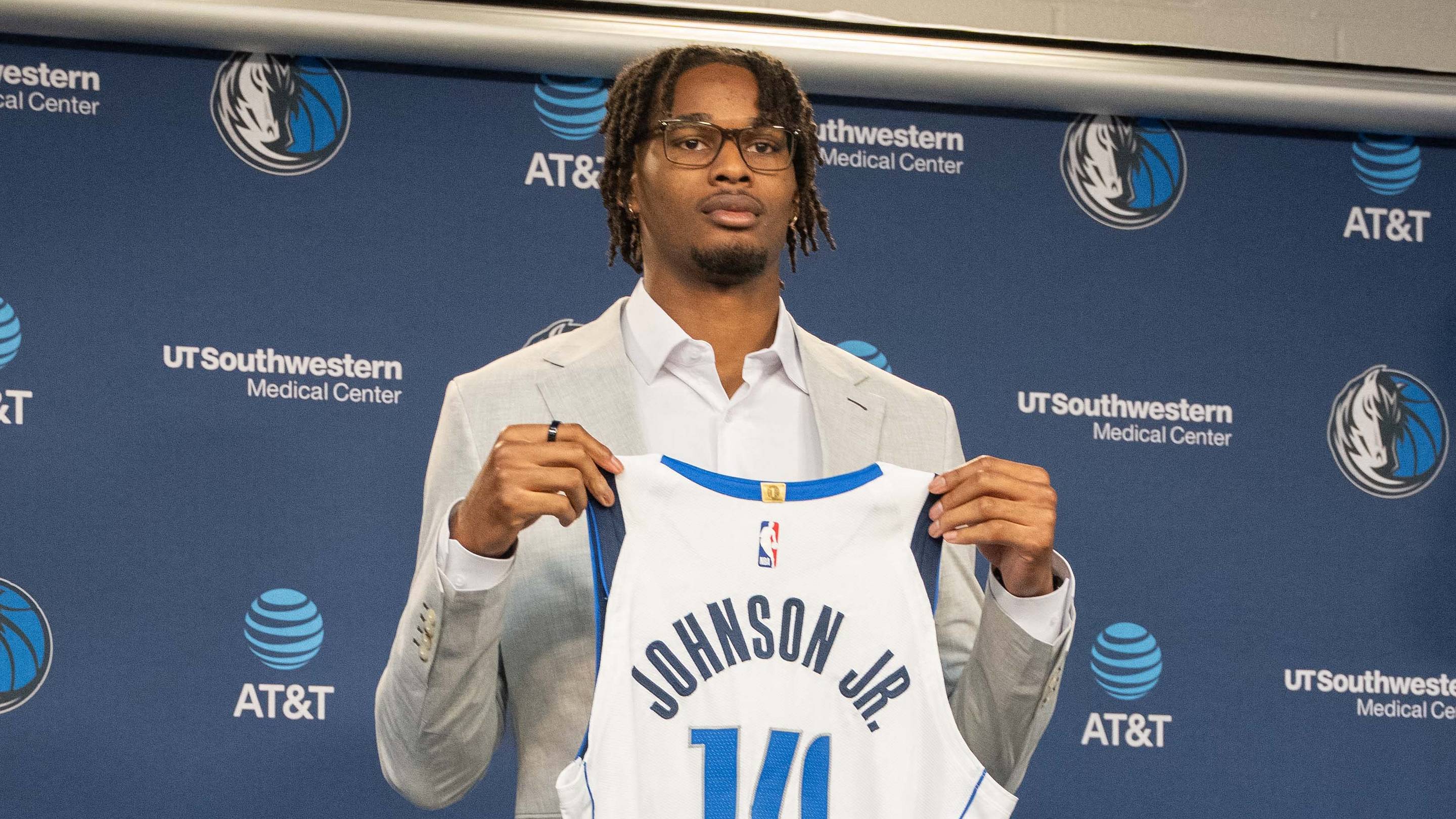 Jun 25, 2026; Dallas, TX, USA; Morez Johnson Jr, the Dallas Mavericks first-round pick in the 2026 NBA draft holds his jersey during an introductory press conference at American Airlines Center. Mandatory Credit: Raymond Carlin III-Imagn Images