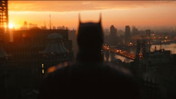ROBERT PATTINSON as Batman in Warner Bros. Pictures’ action adventure “THE BATMAN,” a Warner Bros. Pictures release. Courtesy of Warner Bros. Pictures/ ™ & © DC Comics. Pictures release. © 2021 Warner Bros. Entertainment Inc. All Rights Reserved.