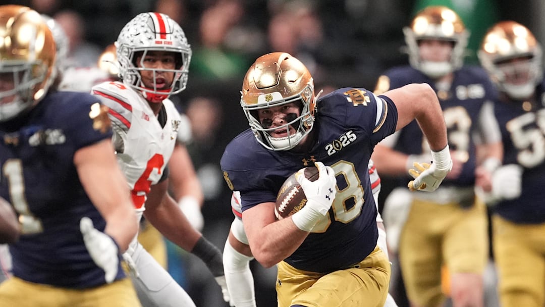 Jan 20, 2025; Atlanta, GA, USA; Notre Dame Fighting Irish tight end Mitchell Evans (88) runs after a catch against the Ohio State Buckeyes in the second half in the CFP National Championship college football game at Mercedes-Benz Stadium. Mandatory Credit: Dale Zanine-Imagn Images