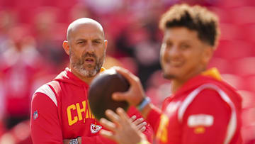 Oct 16, 2022; Kansas City, Missouri, USA; Kansas City Chiefs quarterback coach Matt Nagy watches as quarterback Patrick Mahomes (15) warms up prior to a game against the Buffalo Bills at GEHA Field at Arrowhead Stadium. Mandatory Credit: Jay Biggerstaff-Imagn Images