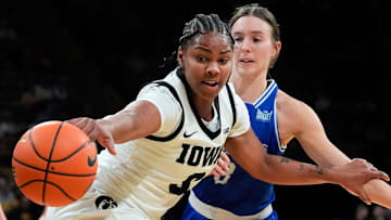 Iowa guard Journey Houston (8) reaches for the basketball against the Drake Bulldogs Nov. 13, 2025 at Carver-Hawkeye Arena in Iowa City, Iowa.