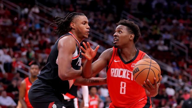 Mar 25, 2024; Houston, Texas, USA; Houston Rockets forward Jae'Sean Tate (8) handles the ball