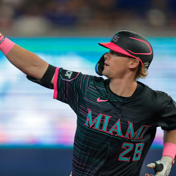 Jul 5, 2025; Miami, Florida, USA; Miami Marlins left fielder Kyle Stowers (28) circles the bases after hitting a solo home run against the Milwaukee Brewers during the second inning at loanDepot Park. Mandatory Credit: Sam Navarro-Imagn Images