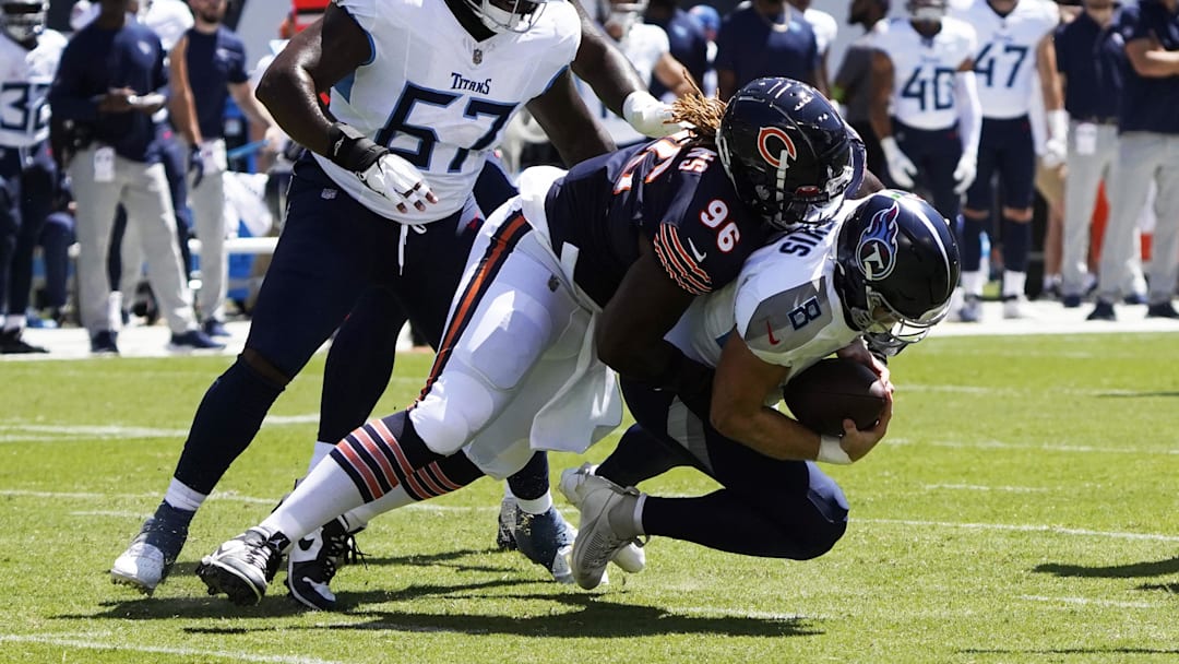 Aug 12, 2023; Chicago, Illinois, USA; Chicago Bears defensive tackle Zacch Pickens (96) sacks Tennessee Titans quarterback Will Levis (8) during the first quarter at Soldier Field. Mandatory Credit: David Banks-Imagn Images